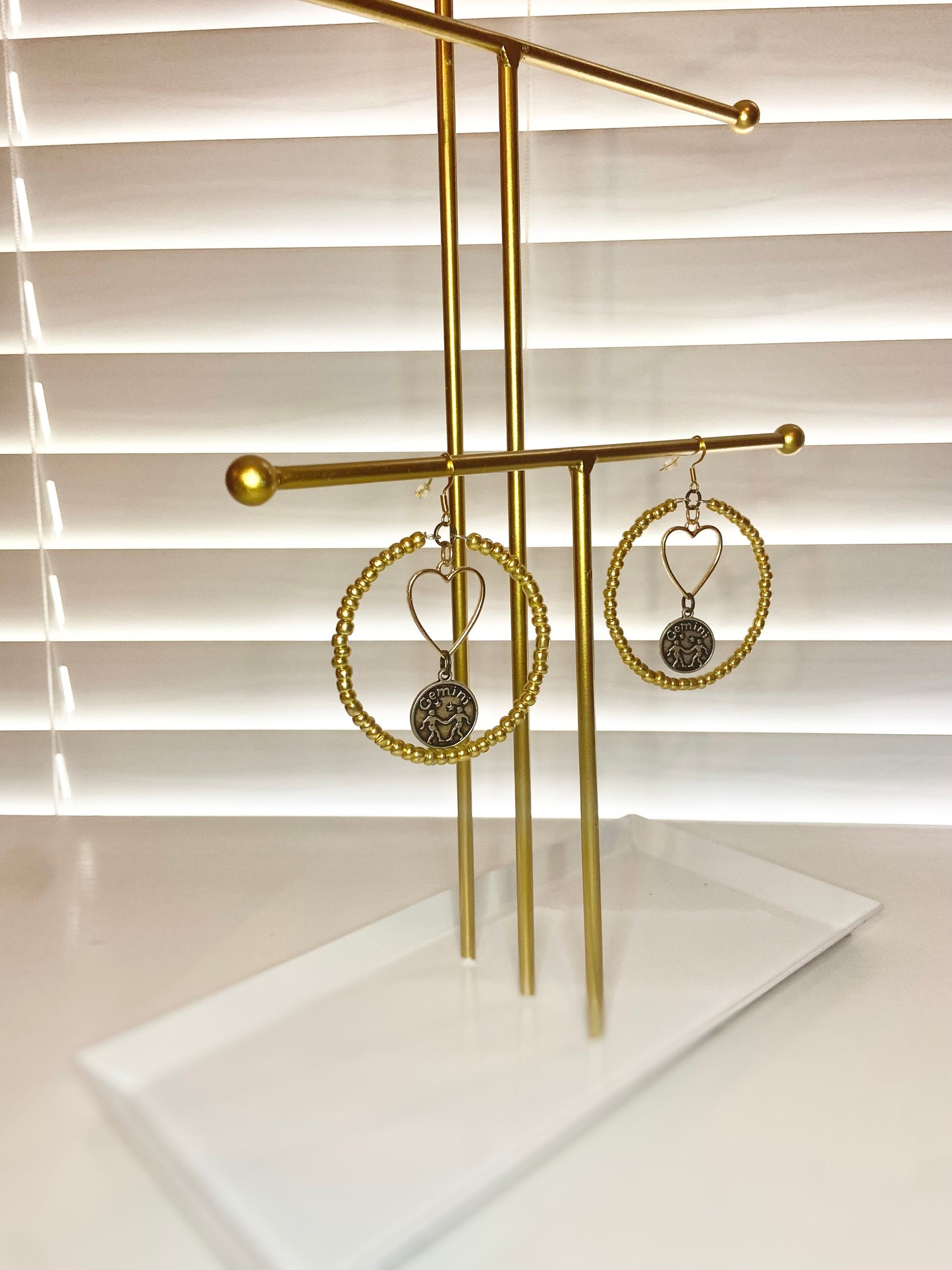 Gold Gemini Hoop