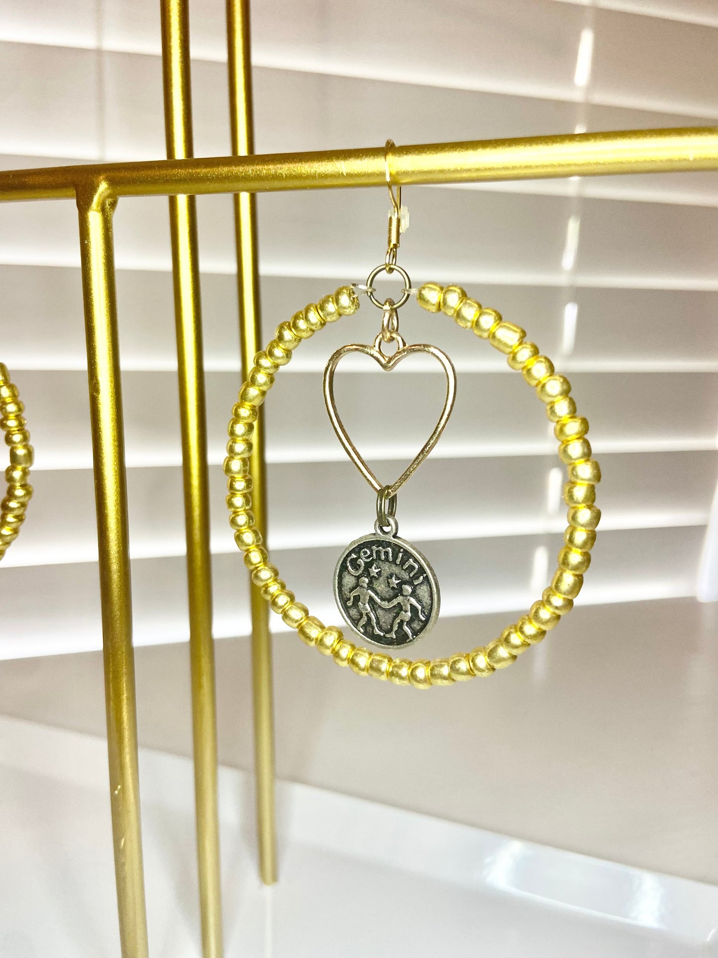 Gold Gemini Hoop